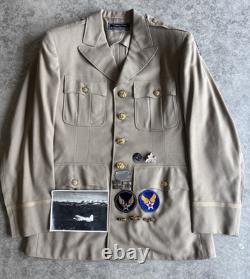 Vintage WWII U. S. Army Air Forces Uniform Jacket with Pins Patches Dog Tags Photo