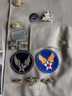 Vintage WWII U. S. Army Air Forces Uniform Jacket with Pins Patches Dog Tags Photo