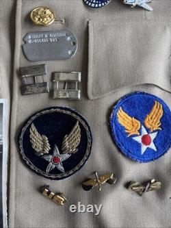 Vintage WWII U. S. Army Air Forces Uniform Jacket with Pins Patches Dog Tags Photo