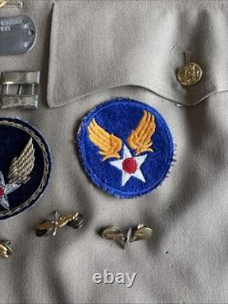 Vintage WWII U. S. Army Air Forces Uniform Jacket with Pins Patches Dog Tags Photo