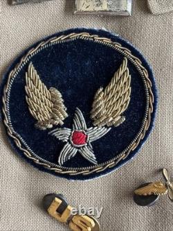 Vintage WWII U. S. Army Air Forces Uniform Jacket with Pins Patches Dog Tags Photo