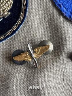 Vintage WWII U. S. Army Air Forces Uniform Jacket with Pins Patches Dog Tags Photo