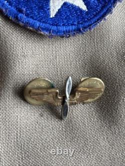 Vintage WWII U. S. Army Air Forces Uniform Jacket with Pins Patches Dog Tags Photo