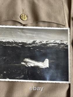 Vintage WWII U. S. Army Air Forces Uniform Jacket with Pins Patches Dog Tags Photo
