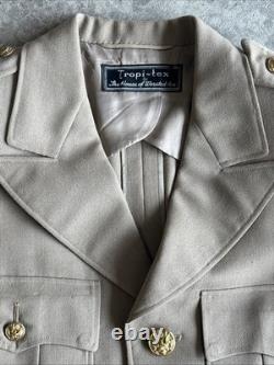 Vintage WWII U. S. Army Air Forces Uniform Jacket with Pins Patches Dog Tags Photo