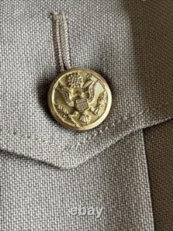 Vintage WWII U. S. Army Air Forces Uniform Jacket with Pins Patches Dog Tags Photo