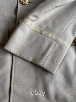 Vintage WWII U. S. Army Air Forces Uniform Jacket with Pins Patches Dog Tags Photo