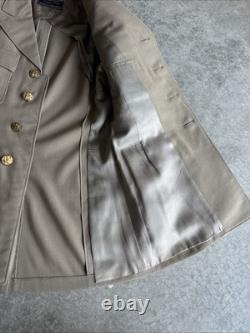 Vintage WWII U. S. Army Air Forces Uniform Jacket with Pins Patches Dog Tags Photo