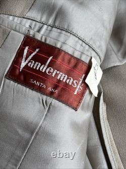 Vintage WWII U. S. Army Air Forces Uniform Jacket with Pins Patches Dog Tags Photo