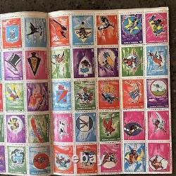WWII Book COMBAT INSIGNIA STAMPS of the US Army & Navy Air Corp + STAMPS Disney
