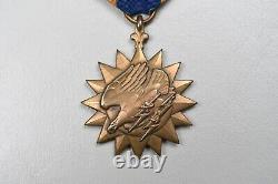 WWII U. S. ARMY AIR CORPS AIR MEDAL withWRAP BROACH NUMBERED