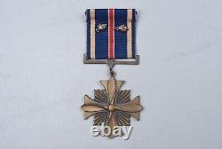 WWII U. S. ARMY AIR CORPS DISTINGUISHED FLYING CROSS with2 OLC IN CASE